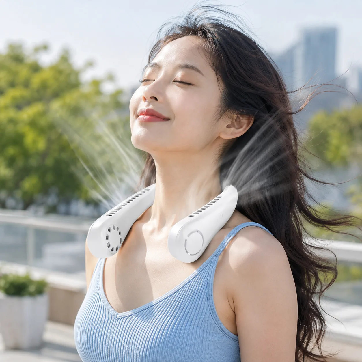 Bladeless hanging neck fan worn around the neck for hands-free cooling thumbnail 2