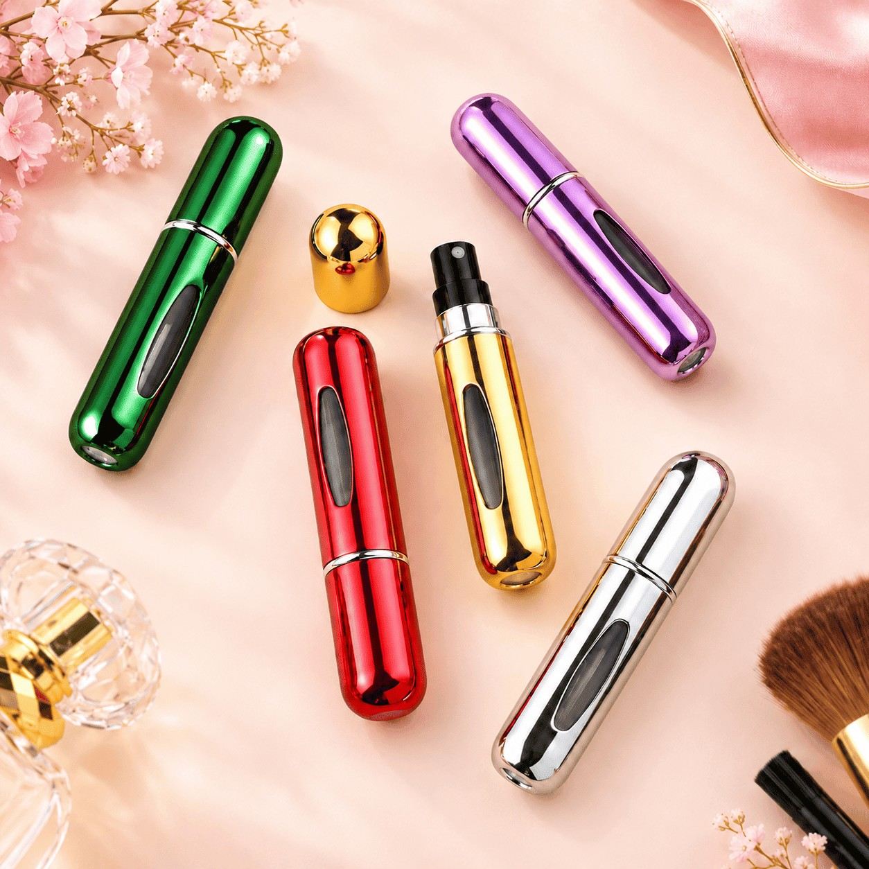 Set of five metallic 5ml refillable perfume atomizers in red, purple, green, gold and silver with fine mist spray nozzle and see-through liquid window
