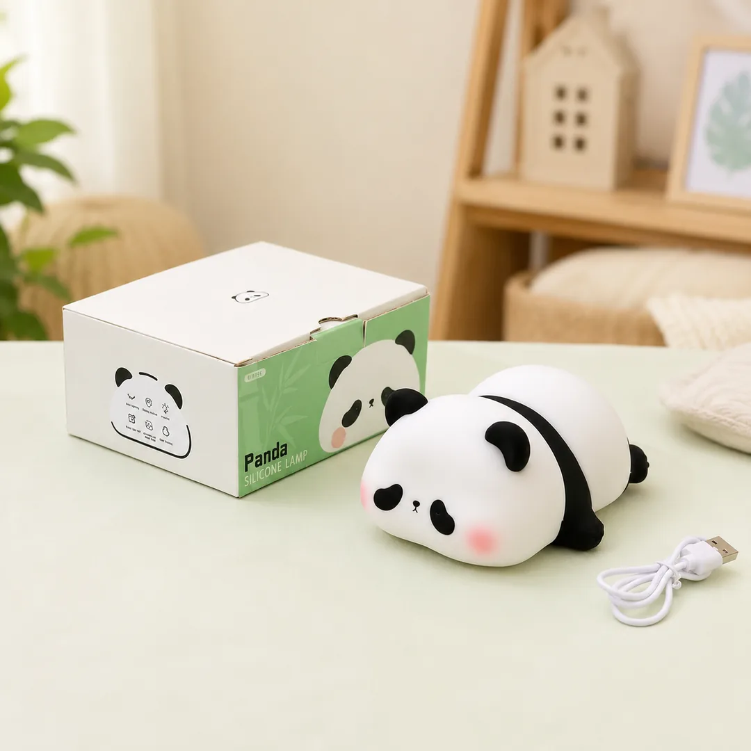 Cute panda silicone night lamp glowing warm on a bed – ZenteMart Pakistan - View 5
