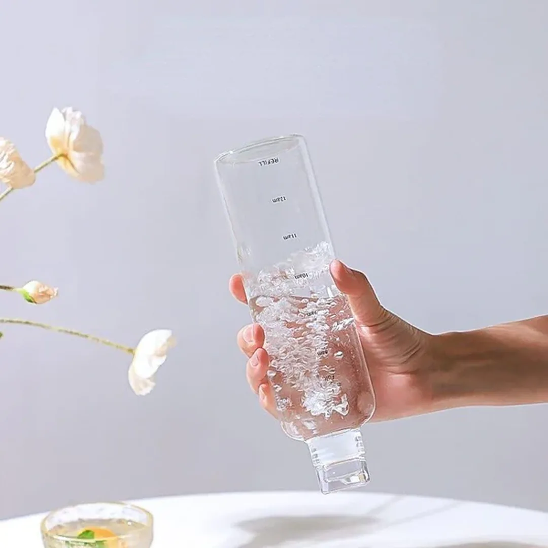 Transparent time marker motivational water bottle held in hand – ZenteMart Pakistan thumbnail 3