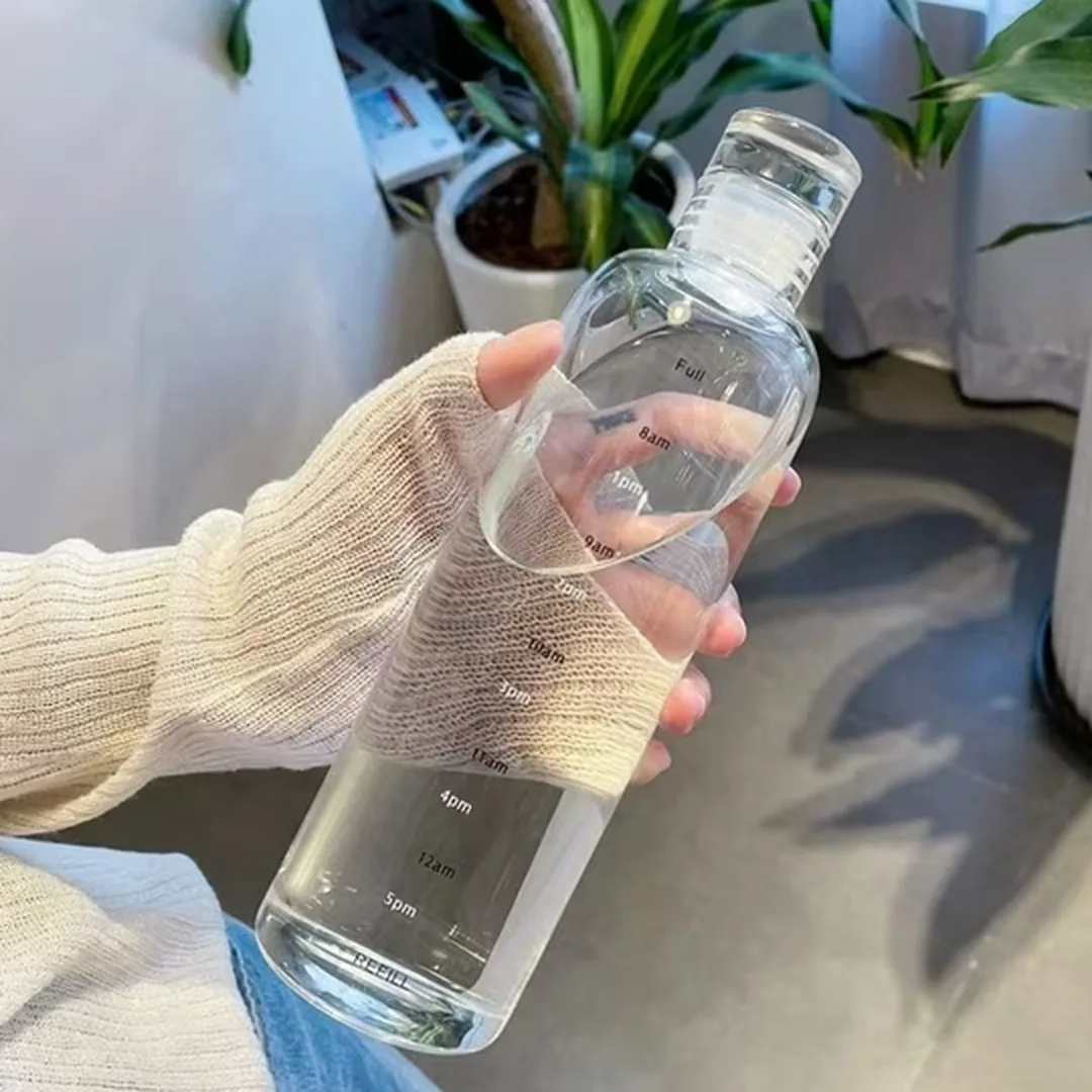 Transparent time marker motivational water bottle held in hand – ZenteMart Pakistan thumbnail 4